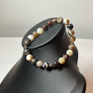 Beaded stretch bracelet. Brown cream tan
Stack em up for a fun boho look
